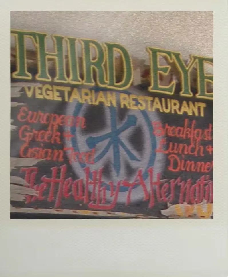 Polaroid of our restaurant's old sign, with the words 'ThirdEye' written on it.